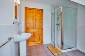 Bathtub, hair dryer, toilet paper