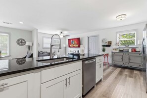 Coffee/tea maker, fridge, microwave, oven