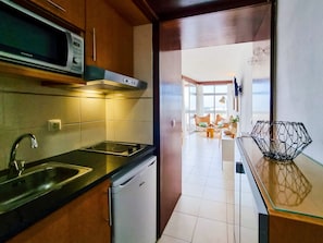 Fridge, microwave, toaster, cookware/dishes/utensils
