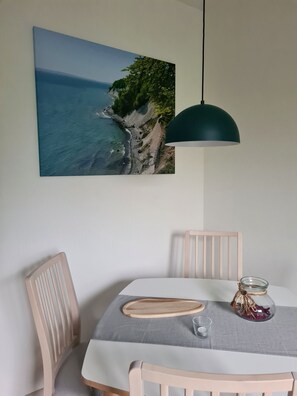 Dining - Apartment UTTIED Rügen with terrace and garden **** Stars DTV (Rambin)