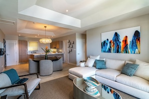 Deluxe Condo, Multiple Beds, Pool Access, Ocean View | Living area | 55-inch Smart TV with digital channels, TV