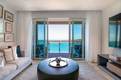 Premium Condo, 2 Bedrooms, Ocean View | Living area | 55-inch Smart TV with digital channels, TV