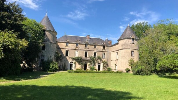 A large, historic building with multiple towers and a central courtyard. - Chateau de la Mothe (Saint-Sulpice-en-Pareds)