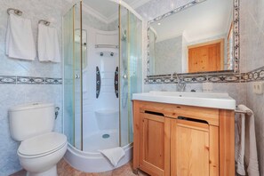 Bathtub, hair dryer, towels, soap