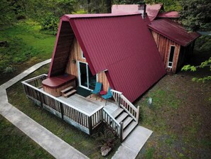 A cabin with a red roof, a deck, and a hot tub. - A-Frame Cabin - 5 Mins to NP - Tilted Timbers (Ashford)