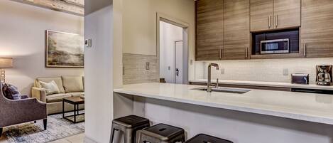 Fridge, microwave, coffee/tea maker, toaster