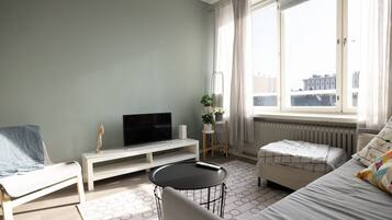 Comfort Apartment | Living area | 30-inch TV with cable channels