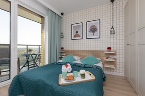 Apartemen, 1 kamar tidur, balkon | 1 kamar tidur dan seprai linen