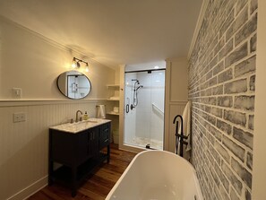 Bathtub, hair dryer, towels, soap