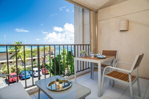 Outdoor dining - Serene Beach Condo- One Bedroom w/ Balcony (Smith Bay)