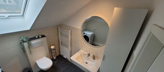 Cozy attic apartment with balcony