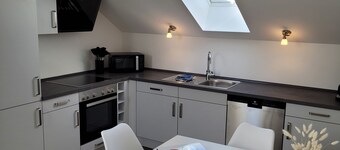 Cozy attic apartment with balcony