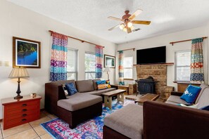 TV, fireplace, books, stereo