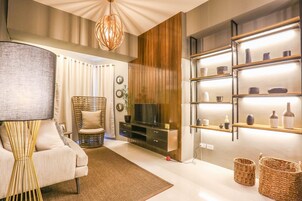 Luxury Condo, 1 Bedroom, Non Smoking, Beach View | Living area | 42-inch LED TV with digital channels
