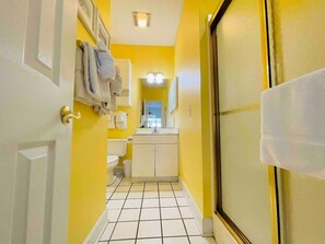 Combined shower/bathtub, hair dryer