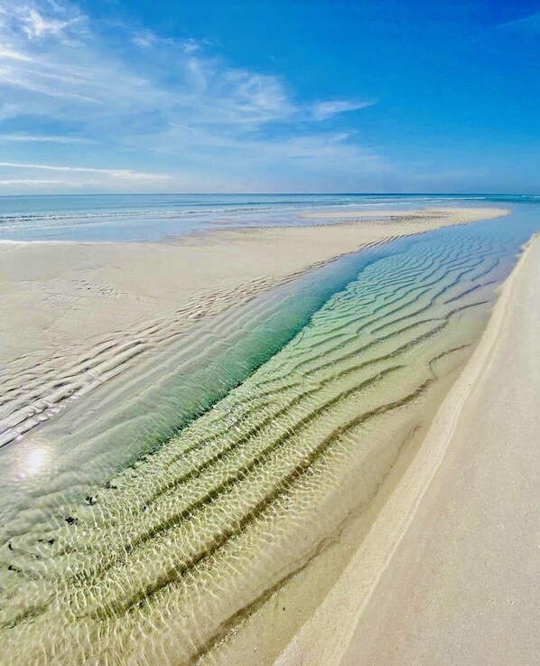 På stranden og solsenger