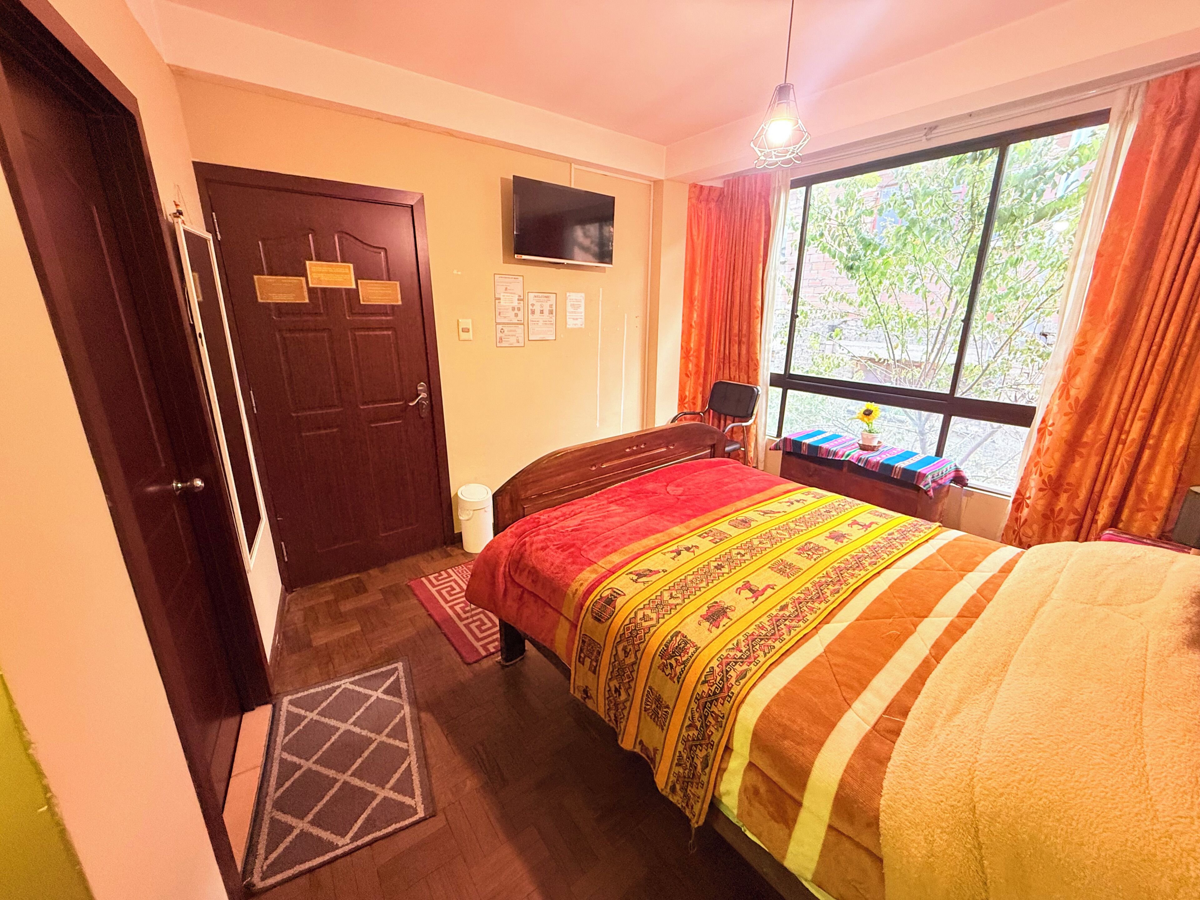 Deluxe Room | Down comforters, free minibar items, individually decorated