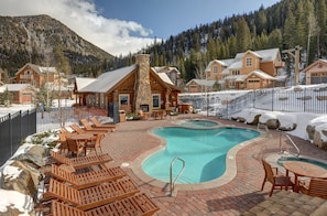Relax by the resort's central pool surrounded by comfortable seating and take in the breathtaking mountain views.