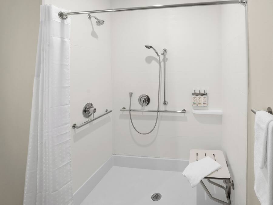 A walk-in shower with a glass door, a handheld showerhead, a handheld showerhead, a handheld showerhead, a handheld showerhead, a handheld showerhead, a handheld showerhead, a handheld showerhead, a handheld showerhead, a handheld showerhead, a handheld showerhead, a handheld showerhead, a handheld showerhead, a handheld showerhead, a handheld showerhead, a handheld showerhead, a handheld showerhead, a handheld showerhead, a handheld showerhead, a handheld showerhead, a handheld showerhead, a handheld showerhead, a handheld showerhead, a handheld showerhead, a handheld showerhead, a handheld showerhead, a handheld showerhead, a handheld showerhead, a handheld showerhead, a handheld showerhead, a handheld showerhead, a handheld showerhead, a handheld showerhead, a handheld showerhead, a handheld showerhead, a handheld showerhead, a handheld showerhead, a handheld showerhead, a handheld shower