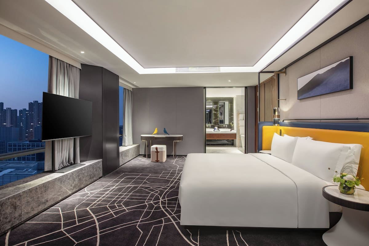 Down comforters, free minibar, individually decorated