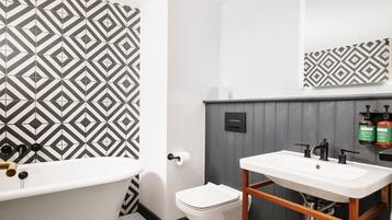 Studio Suite, 1 King Bed, Bathtub (Separate Bath and Shower) | Bathroom | Hair dryer, towels, soap, shampoo