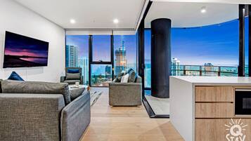 Apartment, 3 Bedrooms | Living area | 18-inch flat-screen TV with digital channels, TV