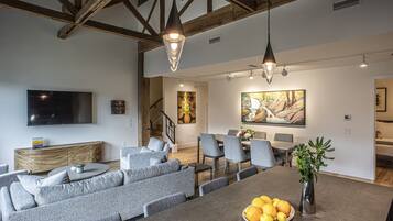 Superior Apartment | Living room | 55-inch LCD TV with digital channels, TV, fireplace