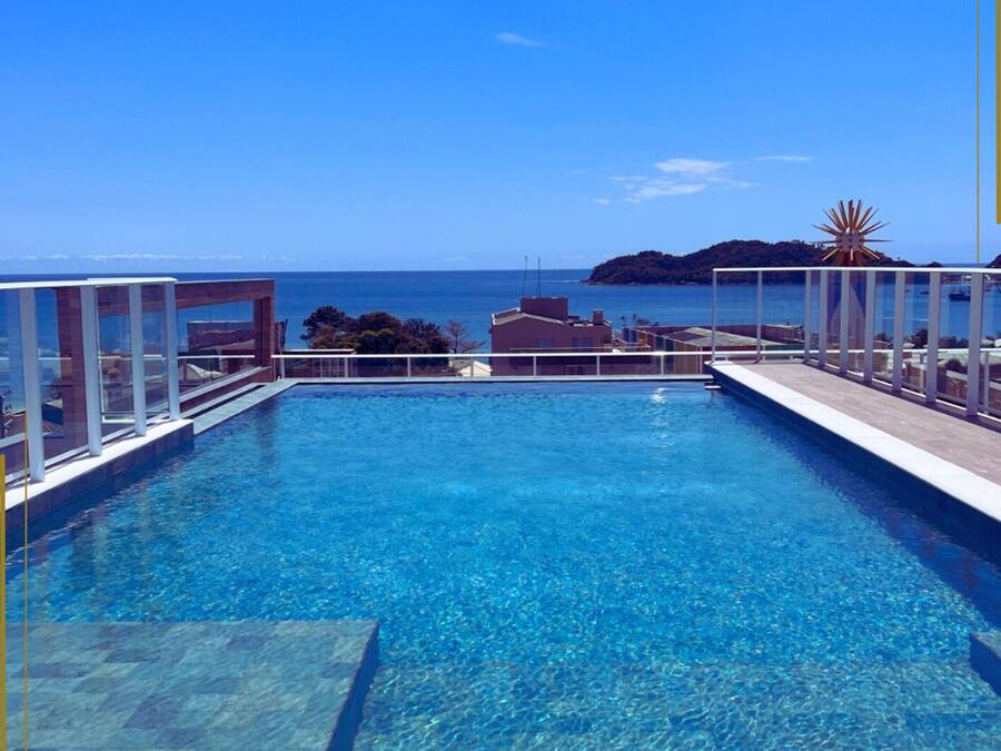 Outdoor pool, open 9:00 AM to 10:00 PM, pool umbrellas, pool loungers