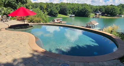 Beautiful lakeside family or corporate retreat with pool, hot tub, and more!