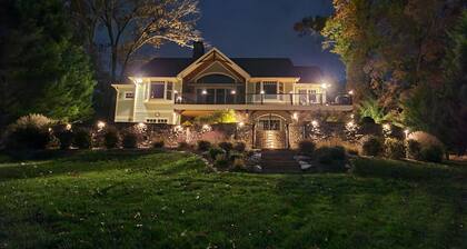 Beautiful lakeside family or corporate retreat with pool, hot tub, and more!