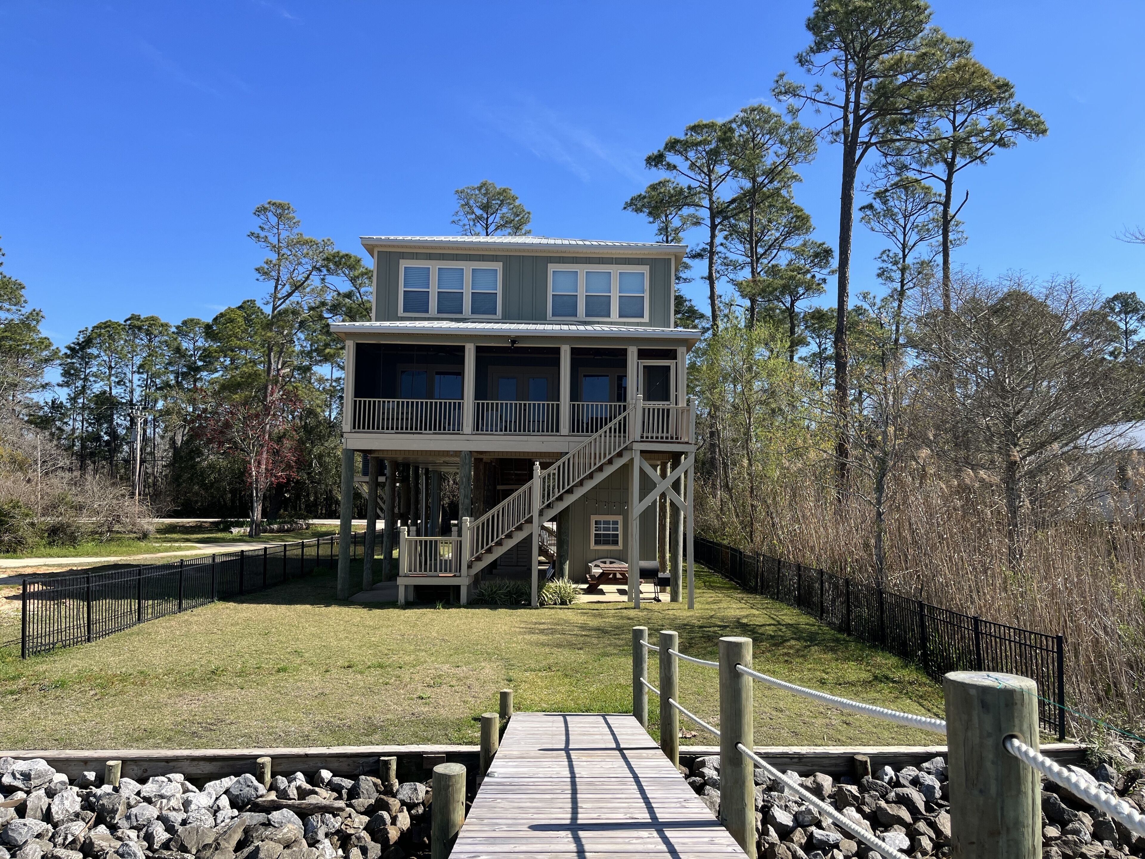A tranquil waterfront escape with breathtaking sunset views and a private pier