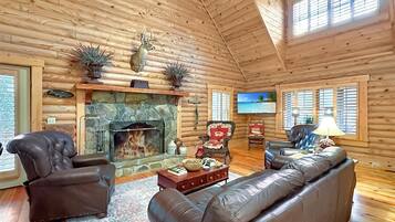 Télévision, cheminée, table de tennis de table