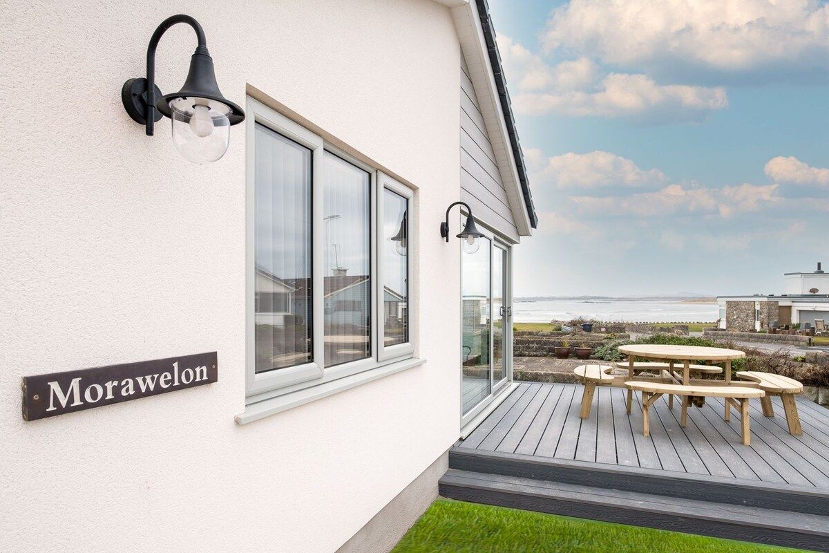 A property named Morawelon with a deck and outdoor seating.