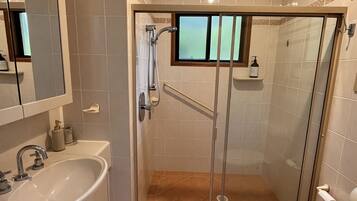 Shower, hair dryer, towels, soap