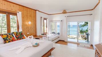 Beachfront Triple Room | Cortinas opacas, sistema de insonorización, wifi gratis