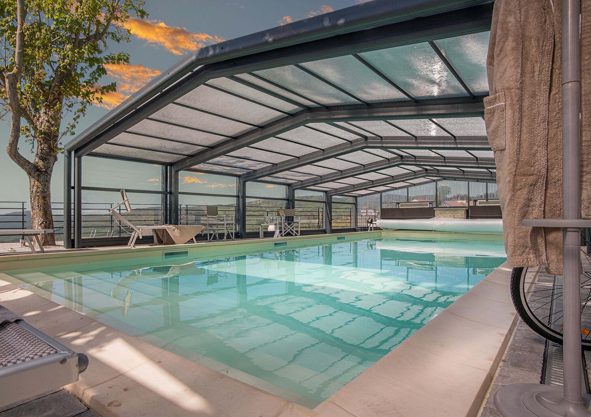 Indoor pool, outdoor pool, open 9:00 AM to 7:00 PM, pool umbrellas