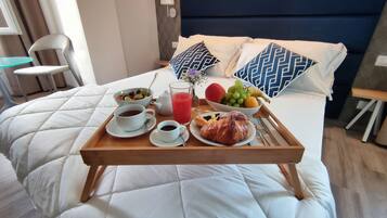 Premium bedding, down comforters, in-room safe, desk