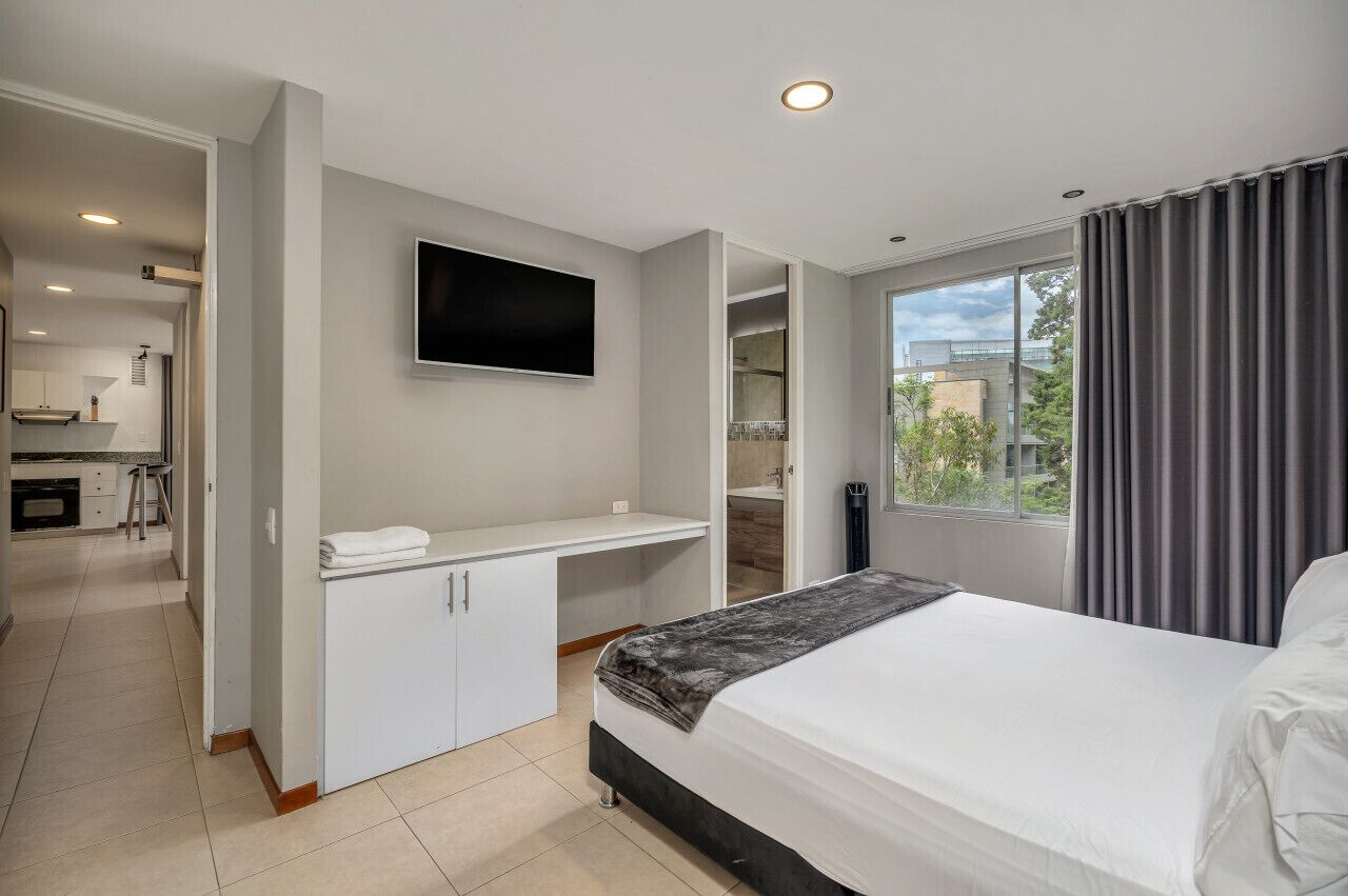 1 bedroom, desk, iron/ironing board, travel crib