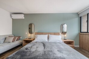 1 bedroom, desk, iron/ironing board, travel crib