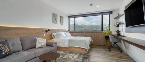 1 bedroom, desk, iron/ironing board, travel cot