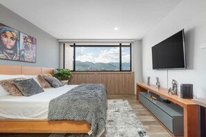1 bedroom, desk, iron/ironing board, travel cot