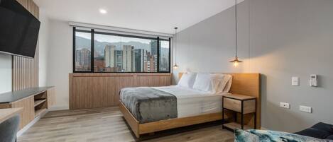 1 bedroom, desk, iron/ironing board, travel crib