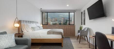 1 bedroom, desk, iron/ironing board, travel crib