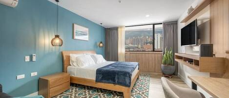 1 bedroom, desk, iron/ironing board, travel crib