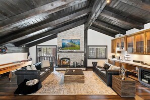 TV, fireplace - Grand Swiss: Extraordinary Secluded Chalet-Style Estate Nestled on Nearly 3 Acres! Outdoor Hot Tub! Movie Theater! Game Room! (Big Bear Lake)
