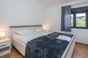 Apartamento econômico (A2) | 2 quartos, Wi-Fi de cortesia, roupa de cama