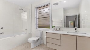 Shower, hair dryer, towels