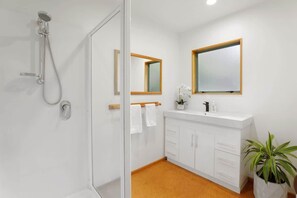Shower, hair dryer, towels