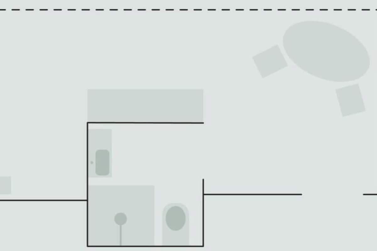 A hotel layout with a large central room, a smaller room, and a circular feature.