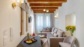 Superior Suite | Living area | Flat-screen TV